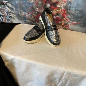 Silver and black women’s loafers size 9